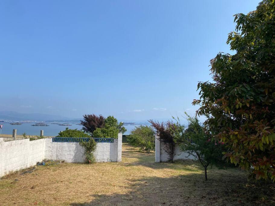 הוילה איסלה דה ארוסה La Casilla - Illa Isla De Arousa - Preciosa Casa Enfrente A Playa Con Vistas Al Mar Y Playa מראה חיצוני תמונה